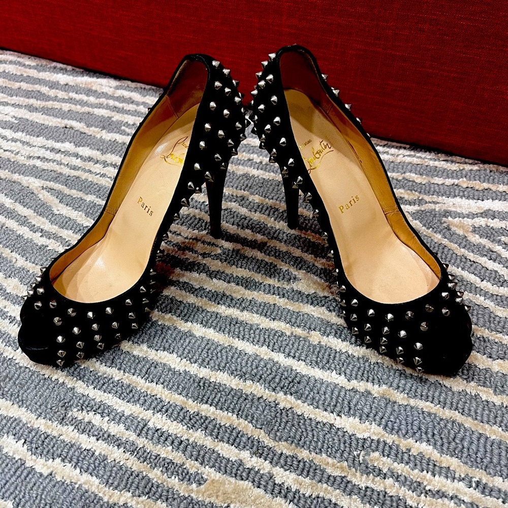 Spike Black Louboutin heels.